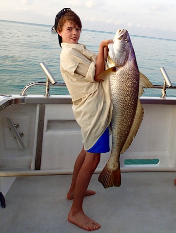 Boy with big fish